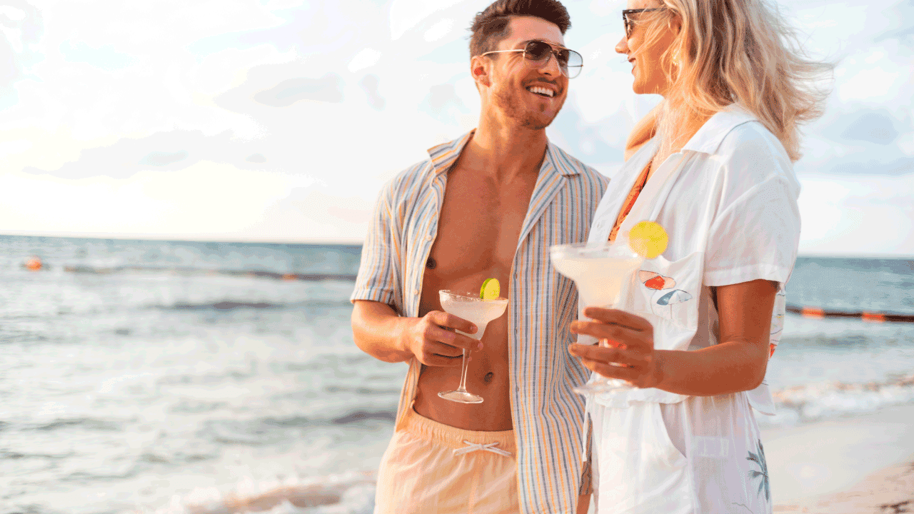 couple drinking at the beach