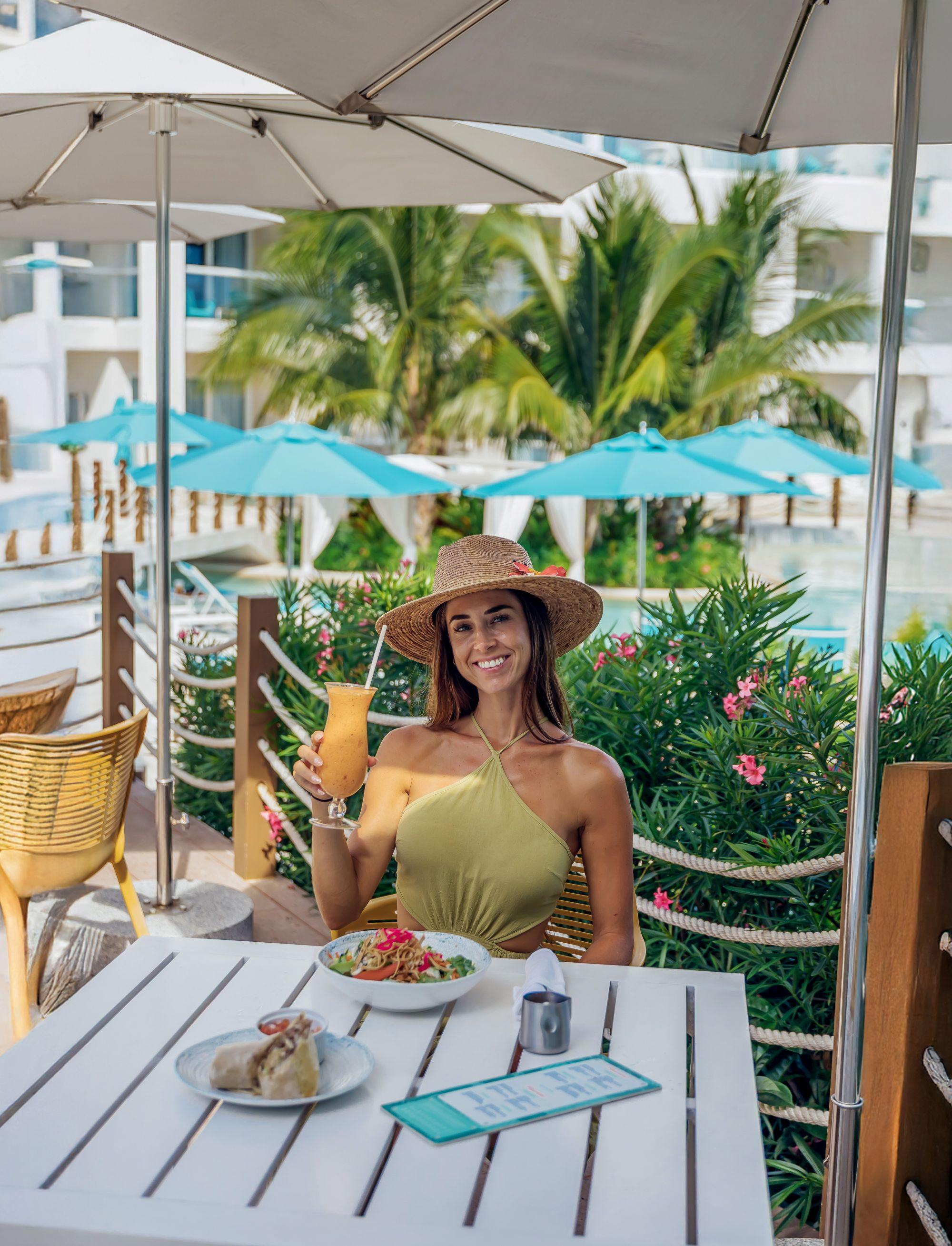 girl eating breakfast in resort
